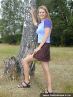 Teen blonde undressing outdoor