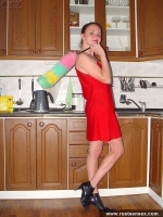 Teen redhead masturbates with dildo
