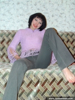 Teen brunette posing and showing shaved pussy