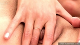 Russian teen blonde rubs her shaved pussy