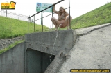 Blonde teen pisses from the height outdoor
