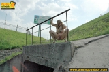 Blonde teen pisses from the height outdoor