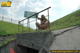 Blonde teen pisses from the height outdoor