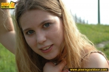 Blonde teen pisses from the height outdoor