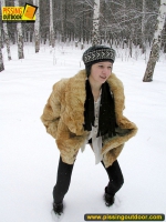 Pissing outdoor in the snow in winter day