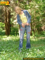 Pissing outdoor in the green forest