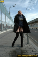 Outdoor pissing of teen blonde in the city street