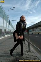 Outdoor pissing of teen blonde in the city street