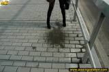 Outdoor pissing of teen blonde in the city street