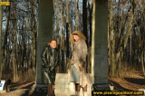 Two girls outdoor pissing on stone columns