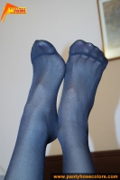 Pantyhose covered feet of teen brunette girl