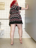 April washes her feet in the ladys room