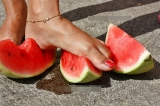 Mature feet and watermelon