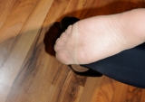 Foot torture with peas in high heels, leggings and corset