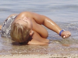 Milf big tits on the beach