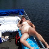 Mature nudist mothers on their boat