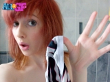 Redhead girlfriend strips in