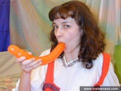 Teen brunette masturbates with orange dildo - N