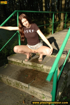 Pissing on a concrete park ladder - N