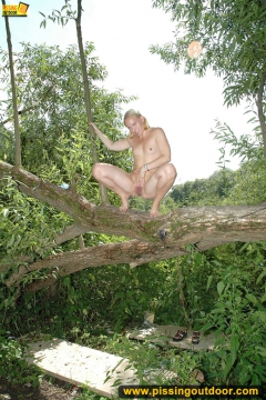 Pissing from a big fallen tree - N