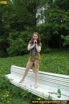 Pissing outdoor on a park bench - N