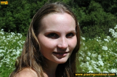 Teen girl pissing on asphalt outdoor - N