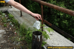 Outdoor pissing of prank blonde on a concrete area - N
