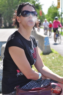 Brunette babe smoking at the park - N