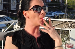 Brunette babe smoking at the terrace - N