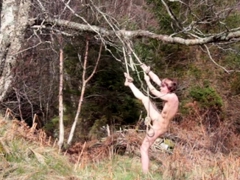 Naked self-bondage in the woods gone wrong.