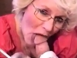 Very hot granny with glasses smoking while sucking dick