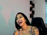 Busty babe playing with her big boobs