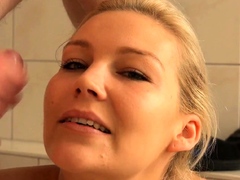 tattooed-amateur-milf-home-blowjob-with-cumshot