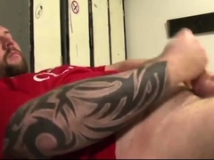 Footballer Bear and Coach Have Fun In the Locker Room